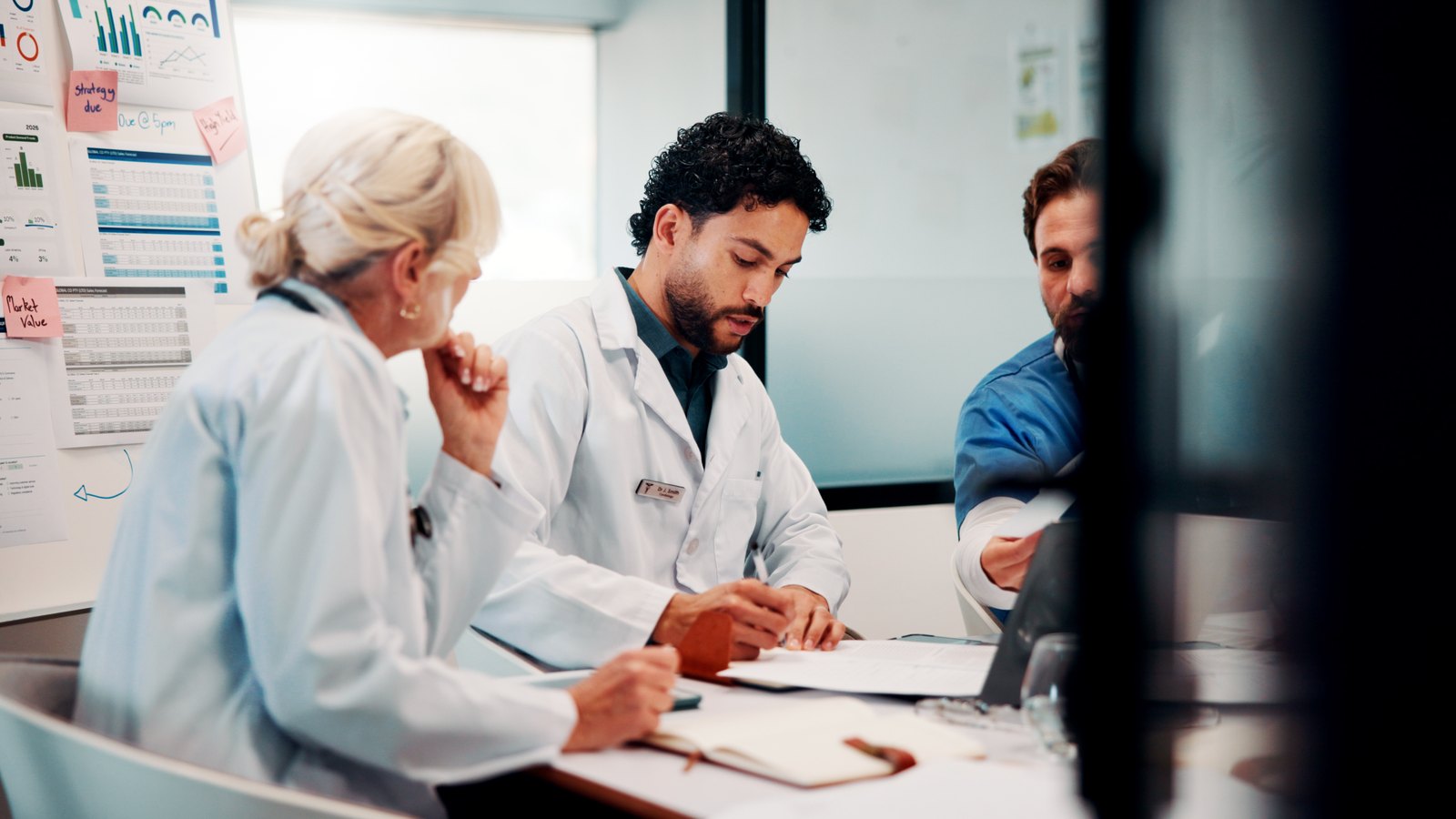 Practice leadership team discussing results in a meeting