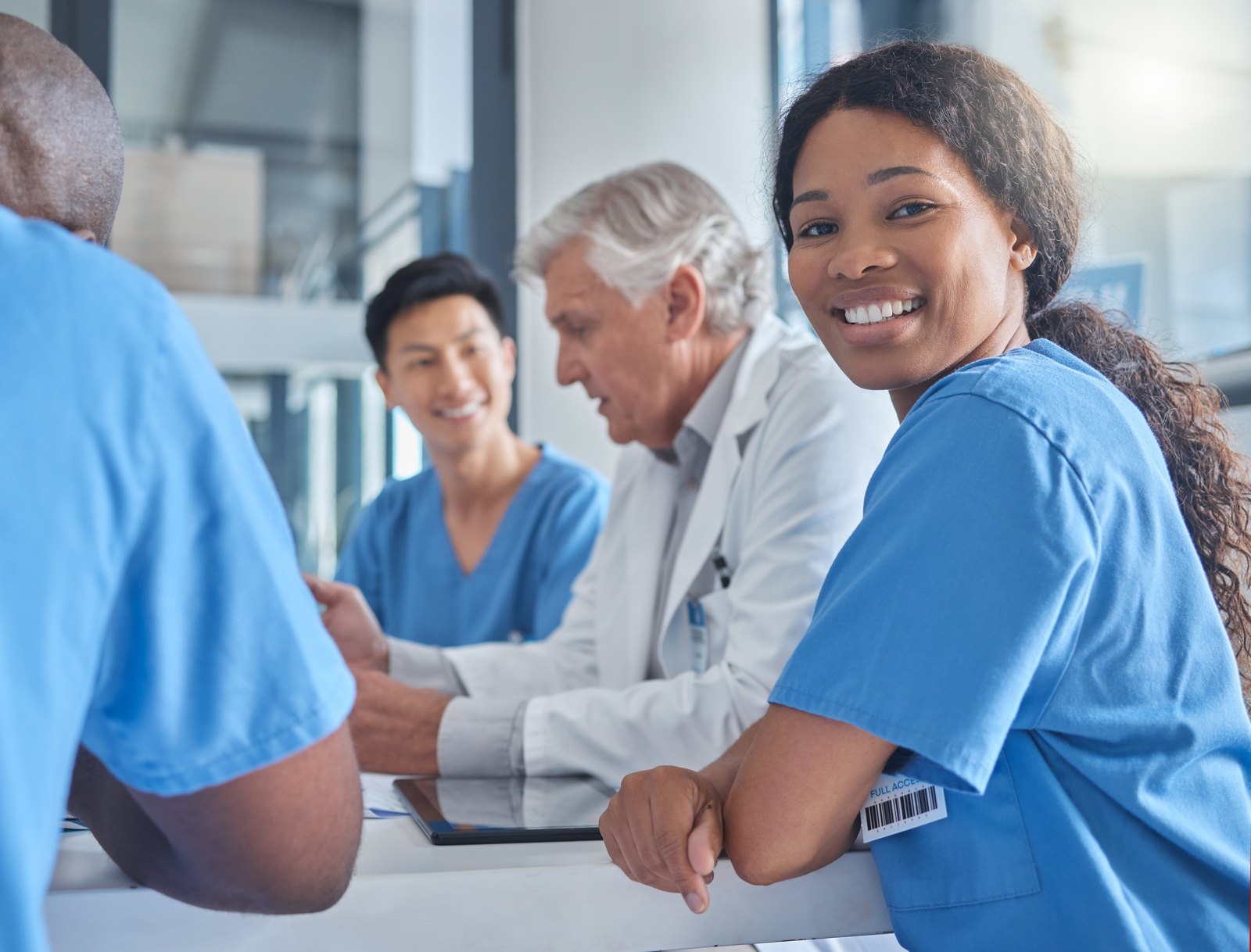 Smiling care team at the front desk